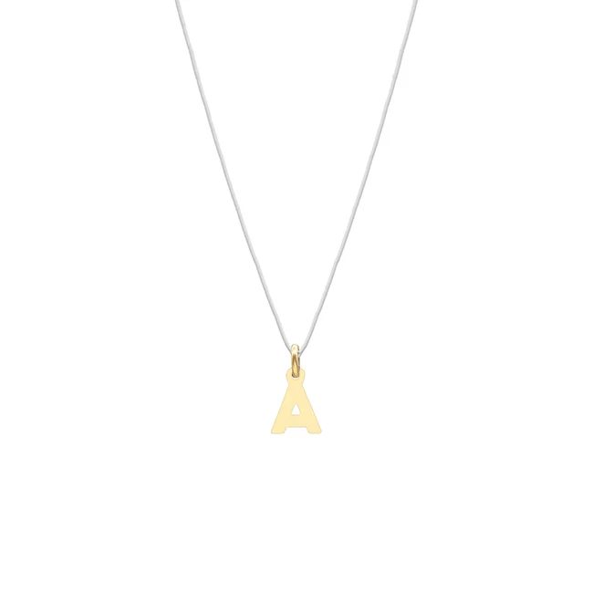 Lantisor fir transparent cu initiala din aur