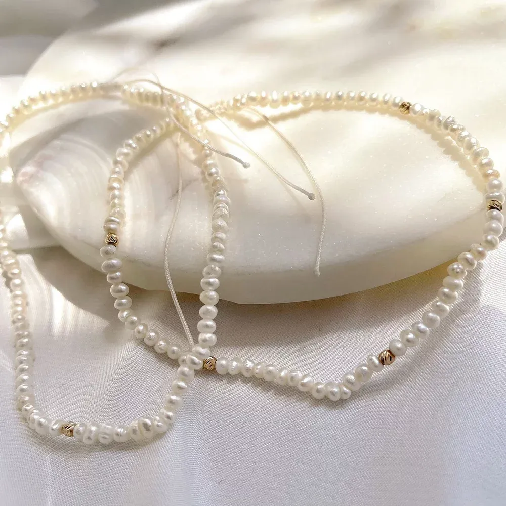 products/650/bratara-de-picior-perle-si-biluta-aur-117256.webp